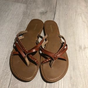 Brown straps flip flops